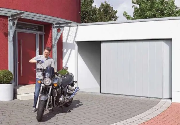 Porte de garage sectionnelle latéral